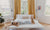 Woman in loungewear almost asleep on bed