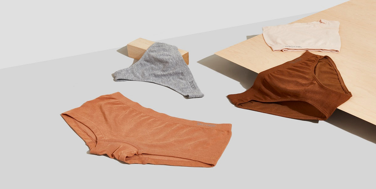 Sevetral pieces of women's underware lying on the floor