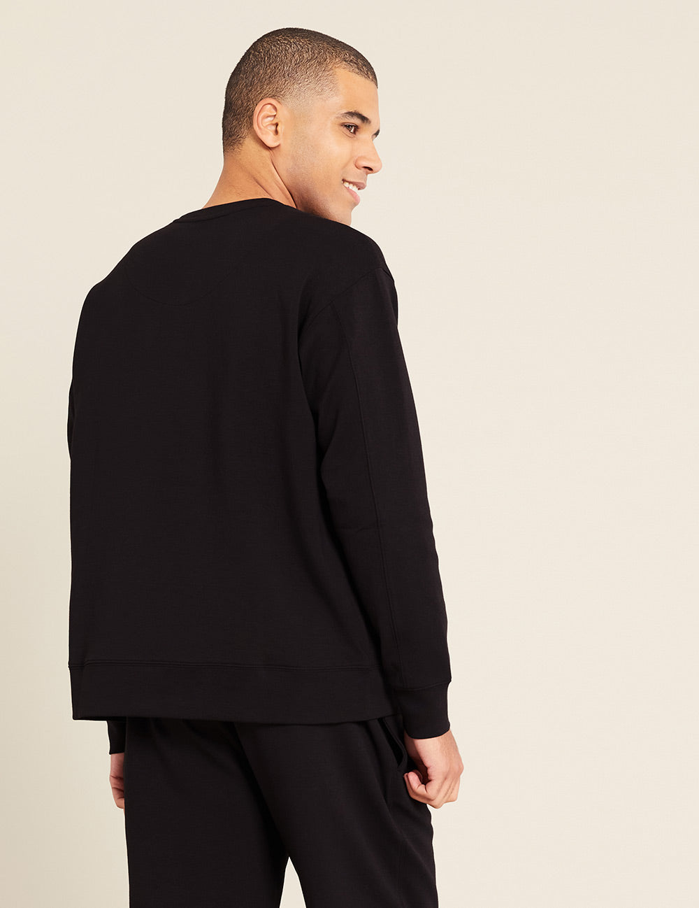 Gender-Neutral-Crew-Neck-Sweater-Black-Male-Back.jpg