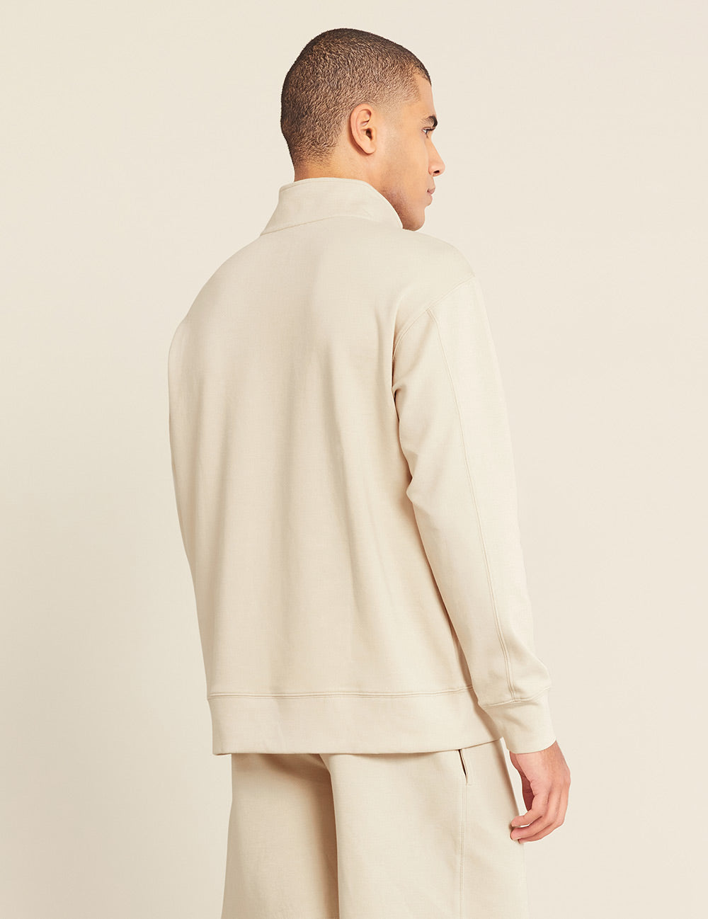 Gender-Neutral-Quarter-Zip-Sweater-Sand-Male-Back.jpg